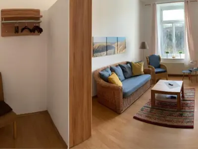 Ein Sitzbereich in der Unterkunft Retreat in the Ore Mountains