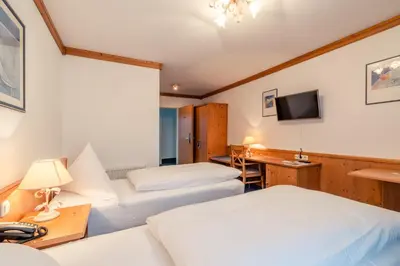 Ein Bett oder Betten in einem Zimmer der Unterkunft AKZENT Hotel Frankenberg