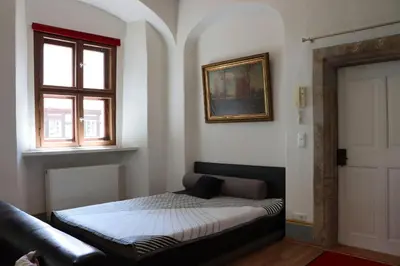 Ein Bett oder Betten in einem Zimmer der Unterkunft Ferienwohnung im Pfarrhaus