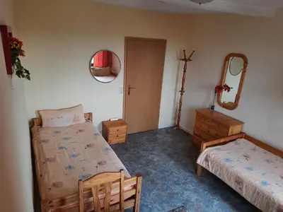 Ein Bett oder Betten in einem Zimmer der Unterkunft Spiegelland - Zuhause für Mitarbeiter