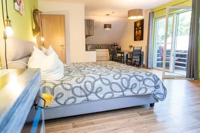 Ein Bett oder Betten in einem Zimmer der Unterkunft Hotel Zur Waldhufe