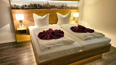 Ein Bett oder Betten in einem Zimmer der Unterkunft Gutshof Hauber