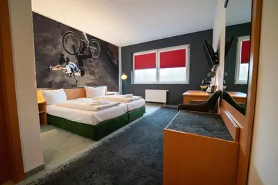 Ein Bett oder Betten in einem Zimmer der Unterkunft Feel Good Hotel