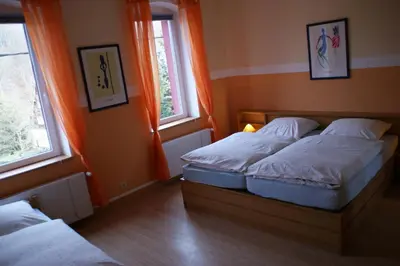Ein Bett oder Betten in einem Zimmer der Unterkunft Ferienwohnung Erzhütte