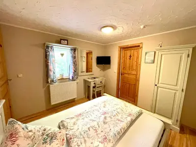 Ein Bett oder Betten in einem Zimmer der Unterkunft Land & Leben Pension
