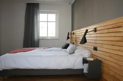 Ein Bett oder Betten in einem Zimmer der Unterkunft FEWO am Markt
