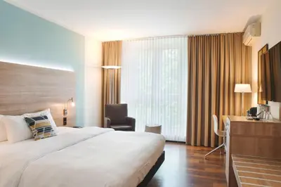 Ein Bett oder Betten in einem Zimmer der Unterkunft Courtyard by Marriott Dresden
