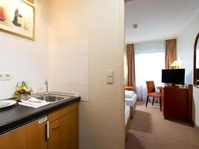 Ein Bett oder Betten in einem Zimmer der Unterkunft ACHAT Hotel Schwarzheide Lausitz