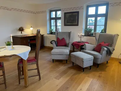 Ein Sitzbereich in der Unterkunft Gutshof Doberschau