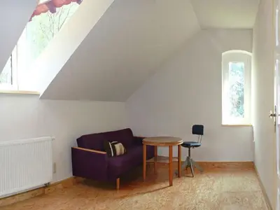 Ein Sitzbereich in der Unterkunft Villa Rotschoenberg im Tal der Freiberger Mulde