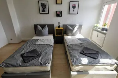 Ein Bett oder Betten in einem Zimmer der Unterkunft Stylish 4ZI Netflix, Kaffeetimer, WIFI, Parken