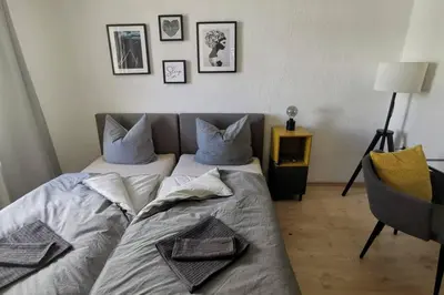 Ein Bett oder Betten in einem Zimmer der Unterkunft Stylish 4ZI Netflix, Kaffeetimer, WIFI, Parken