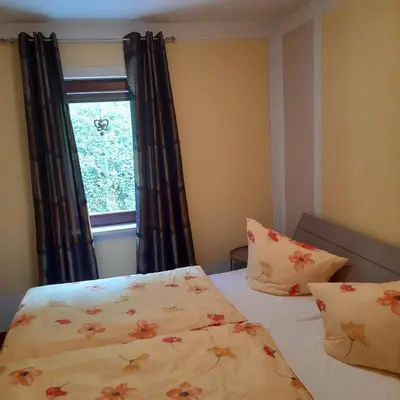 Ein Bett oder Betten in einem Zimmer der Unterkunft Ferienwohnungen Herrmann