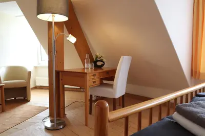 Ein Sitzbereich in der Unterkunft Hotel Sächsischer Hof