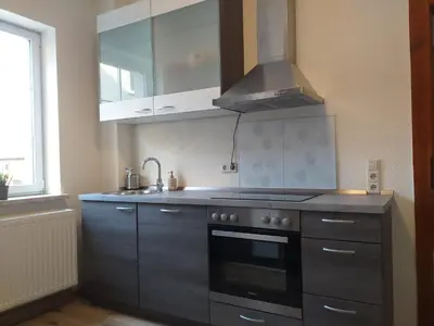 Küche/Küchenzeile in der Unterkunft Ferienwohnung Radebeul Self Check-in