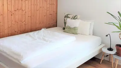 Ein Bett oder Betten in einem Zimmer der Unterkunft Ferienhaus Erna