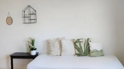 Ein Bett oder Betten in einem Zimmer der Unterkunft Ferienhaus Erna