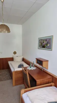 Ein Bett oder Betten in einem Zimmer der Unterkunft Cafe Zur Talsperre
