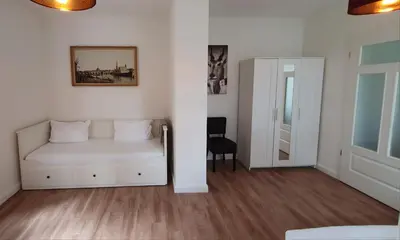 Ein Bett oder Betten in einem Zimmer der Unterkunft Weißer Hirsch Residenz mit Heideblick