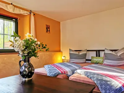 Ein Bett oder Betten in einem Zimmer der Unterkunft Ferienwohnung Hegemühle