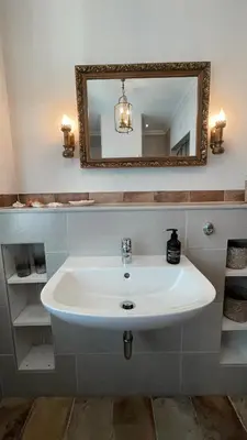 Ein Badezimmer in der Unterkunft Ferienwohnungen Weise im Lausitzer-Seenland