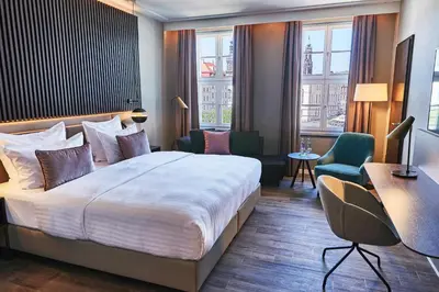 Ein Bett oder Betten in einem Zimmer der Unterkunft Steigenberger Hotel de Saxe