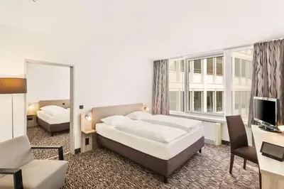 Ein Bett oder Betten in einem Zimmer der Unterkunft Best Western Plus Hotel Dresden City