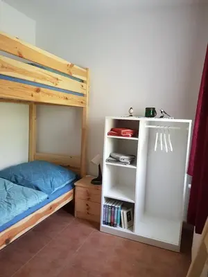 Ein Bett oder Betten in einem Zimmer der Unterkunft Haus Vogelgesang Pirna