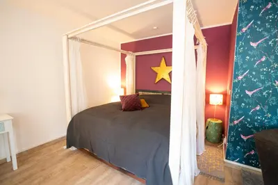 Ein Bett oder Betten in einem Zimmer der Unterkunft Frühling-Studio