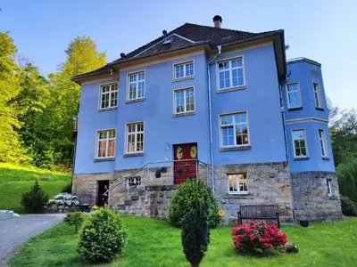 Ein Garten an der Unterkunft Ferienwohnung Bastei