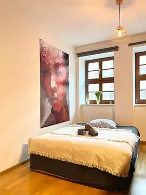 Ein Bett oder Betten in einem Zimmer der Unterkunft Zentrales Studio an der Frauenkirche