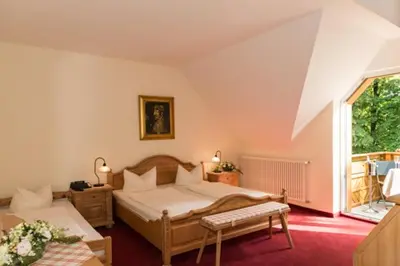 Ein Bett oder Betten in einem Zimmer der Unterkunft Hotel Knorre