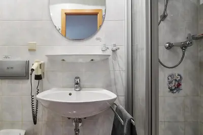 Ein Badezimmer in der Unterkunft Hotel Ladenmühle
