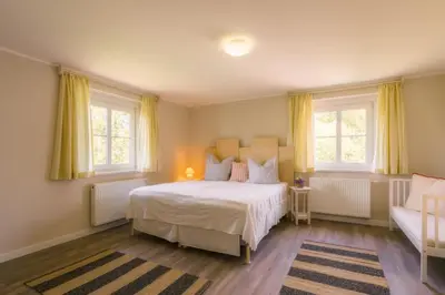 Ein Bett oder Betten in einem Zimmer der Unterkunft Berghaus Falkenhorst