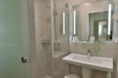Ein Badezimmer in der Unterkunft Berghotel Talblick