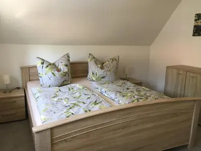Ein Bett oder Betten in einem Zimmer der Unterkunft Ferienwohnung Möckel