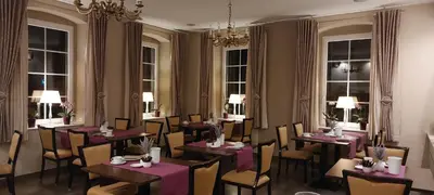Ein Sitzbereich in der Unterkunft Hotel Weiße Taube