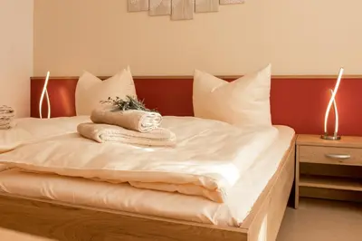 Ein Bett oder Betten in einem Zimmer der Unterkunft Pilgrims Inn Kreischa