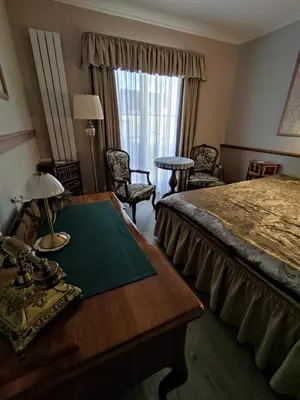 Ein Bett oder Betten in einem Zimmer der Unterkunft Pilgrims Inn Kreischa