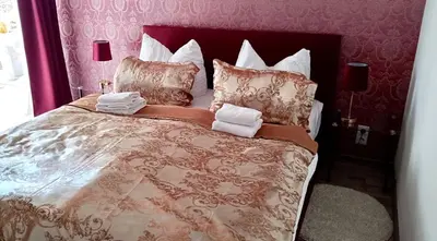 Ein Bett oder Betten in einem Zimmer der Unterkunft Ferienwohnung Pirna-Panorama
