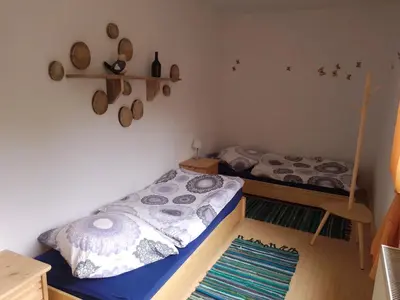 Ein Bett oder Betten in einem Zimmer der Unterkunft Ferienwohnung Linke 
