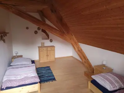 Ein Bett oder Betten in einem Zimmer der Unterkunft Ferienwohnung Linke 