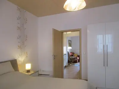 Ein Bett oder Betten in einem Zimmer der Unterkunft Ferienwohnung Schrammsteine