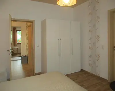 Ein Bett oder Betten in einem Zimmer der Unterkunft Ferienwohnung Schrammsteine