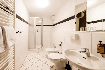 Ein Badezimmer in der Unterkunft Apparthotel Bad Schandau by STEIGER Hotels