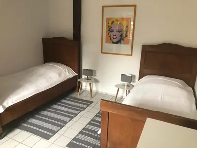 Ein Bett oder Betten in einem Zimmer der Unterkunft Ferienwohnung Kornkäfer 2