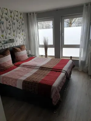 Ein Bett oder Betten in einem Zimmer der Unterkunft Gästewohnung BenjaroS