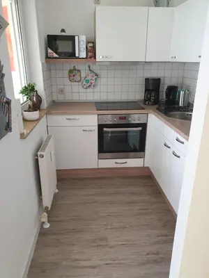 Küche/Küchenzeile in der Unterkunft Gästewohnung BenjaroS