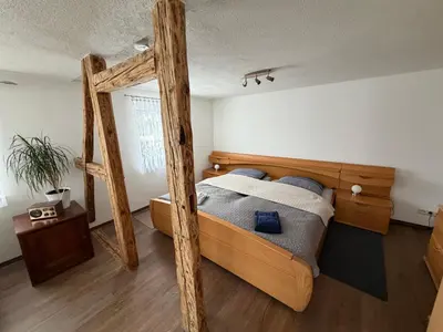 Ein Bett oder Betten in einem Zimmer der Unterkunft Ferienwohnung Lippmann