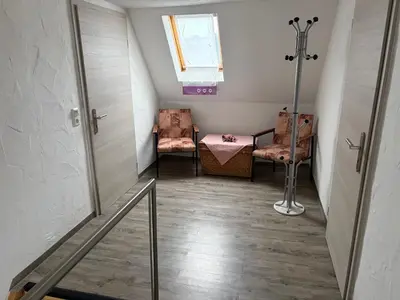 Ein Sitzbereich in der Unterkunft Ferienwohnung Lippmann